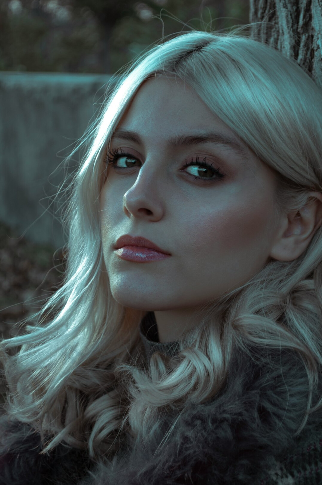 Studio portrait of a young Croatian woman with long blonde hair