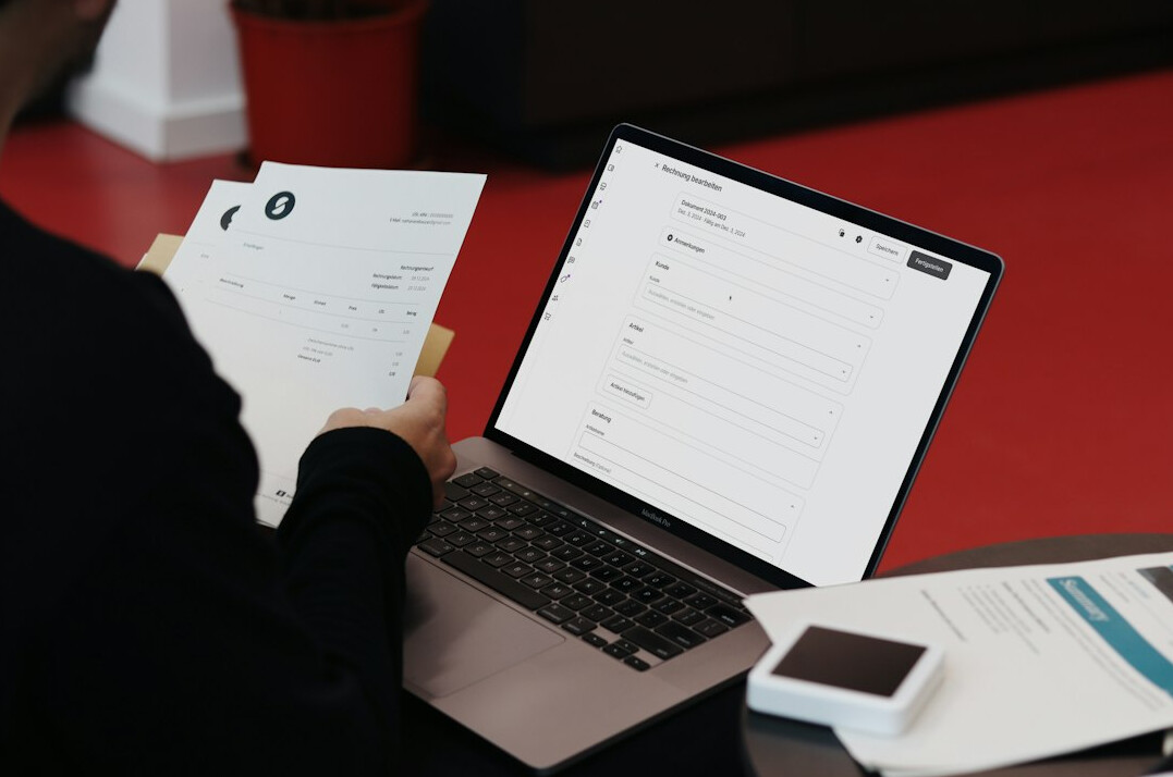 insurance documents and laptop